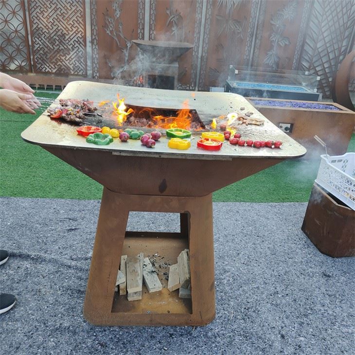 Barbacoa con fogón sin humo y leña
